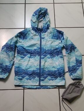 Like new "therm" kids blue multi-stripe wave pattern with pouch raincoat